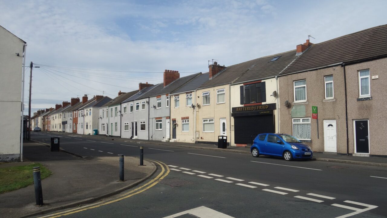 Row of terraced houses on Carrville High Street, a typical UK residential property type affected by HMO planning restrictions