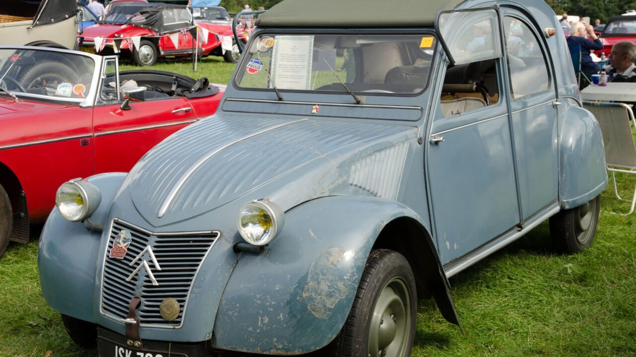Citroen 2CV classic car displayed at Cholmondeley Classic Car Show, England, 2014