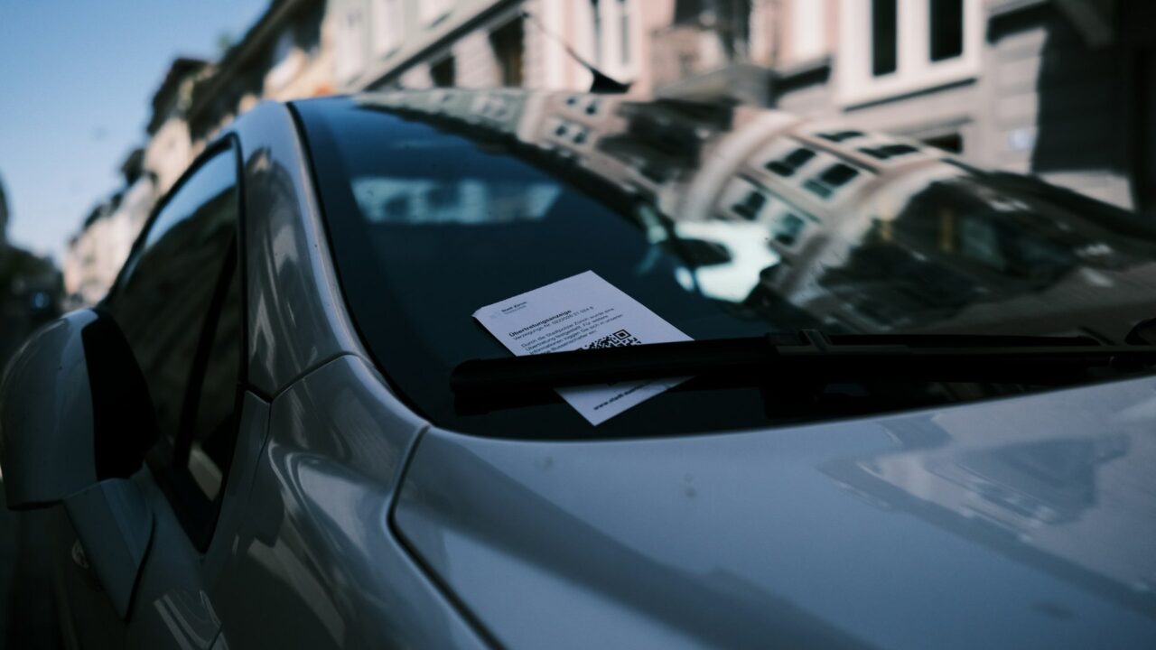A car parked on the side of a road