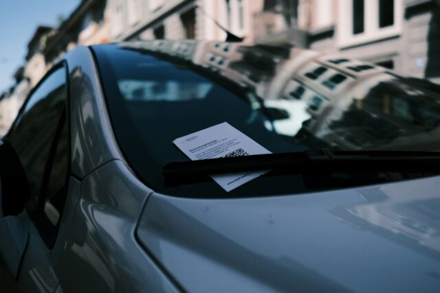 A car parked on the side of a road
