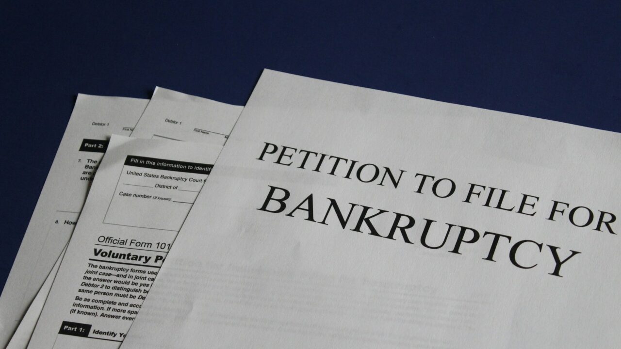 Close-up of a petition document related to bankruptcy filing procedures