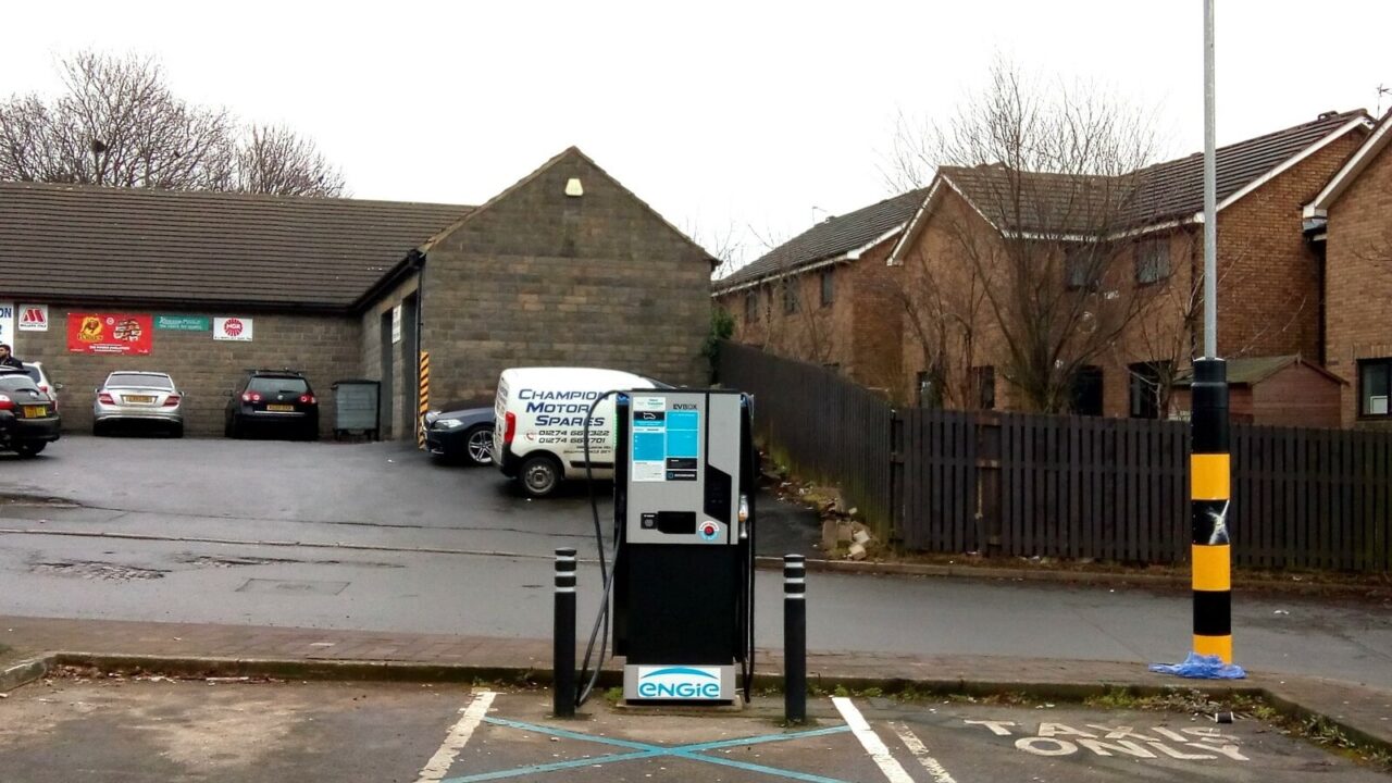 Electric vehicle charging point mounted on a wall in an Orange Street car park in Bradford