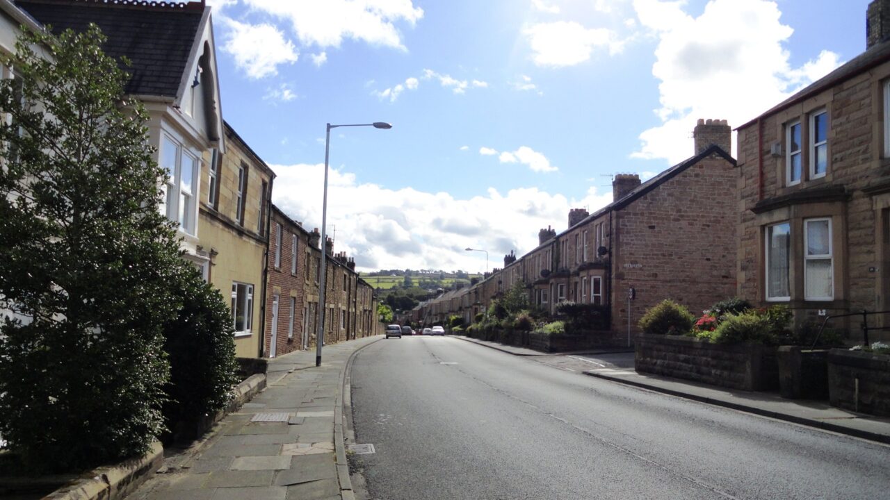 A row of terraced houses on West Road in Hexham, UK