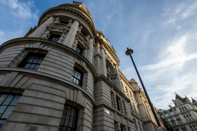 Low angle view of the neoclassical Old War Office building in London against the sky