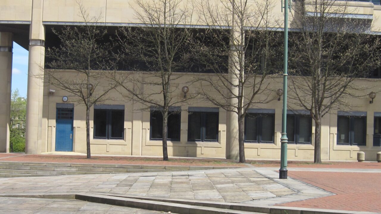 Exterior of Bradford Law Courts, a brick building with classical architectural features