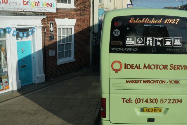 Ideal Motor Services coach parked on York Road, a passenger transport vehicle