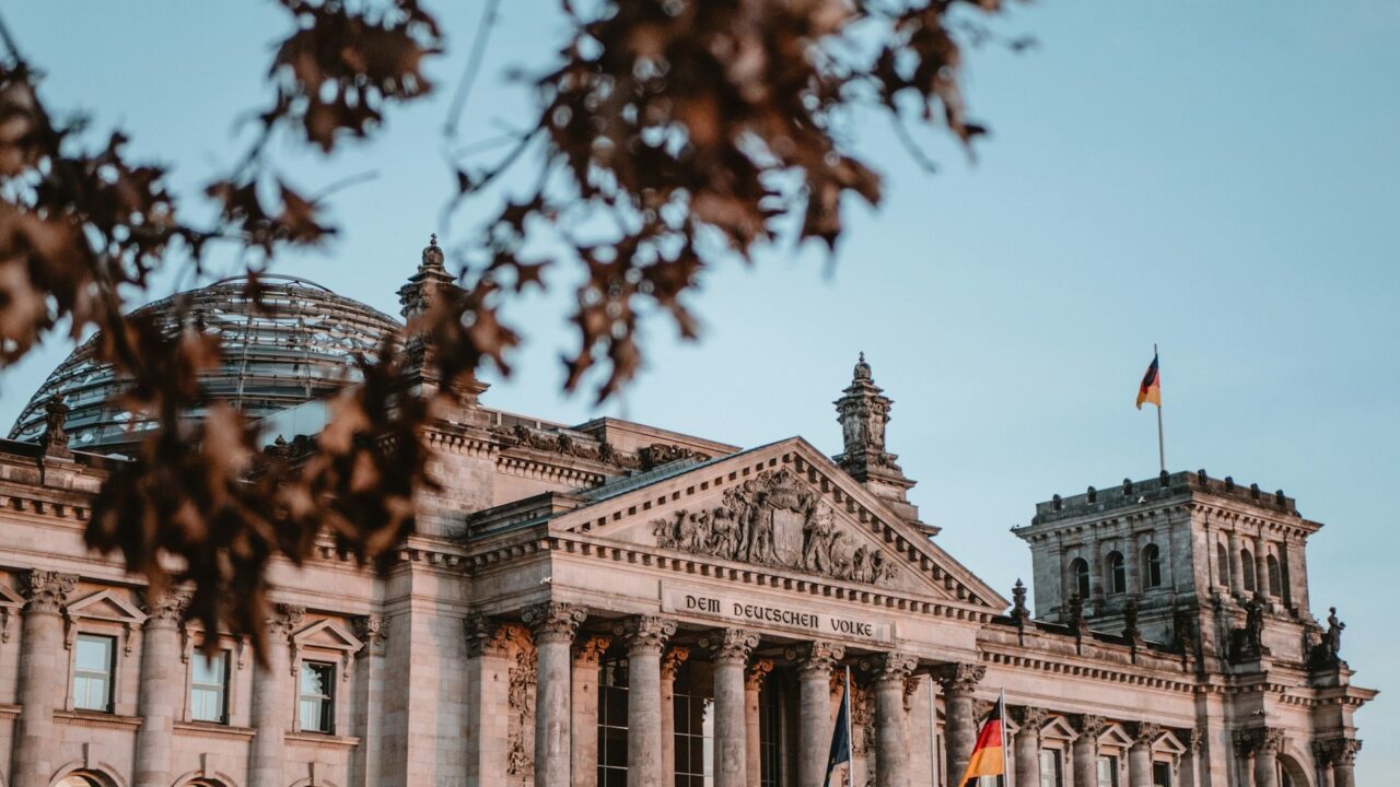 The Reichstag building in Berlin photographed during daytime under clear sky