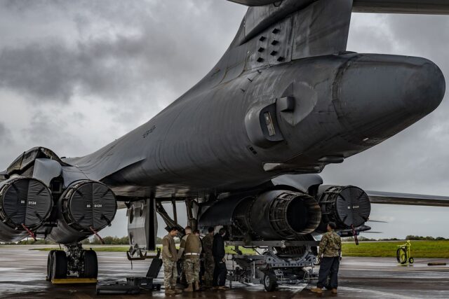 US Air Force personnel working on a B-1 Lancer bomber aircraft at RAF Fairford
